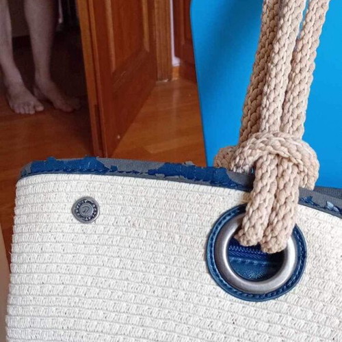 Beach bag used with worn leather
