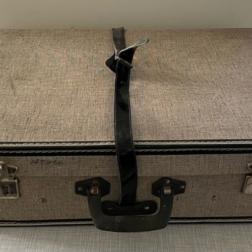 Retro travel suitcase used vintage with fabric lining
