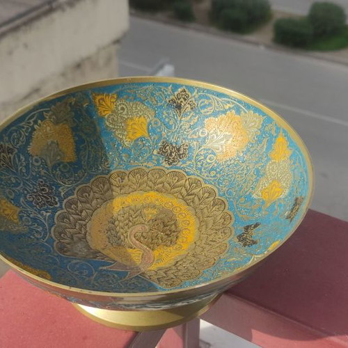 Bronze handmade decorative bowl used from India with peacock design