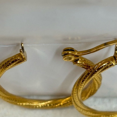 Iron golden rings with a twisted design.