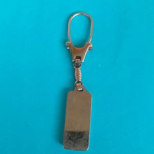 Anek keychain collectible like new, metal