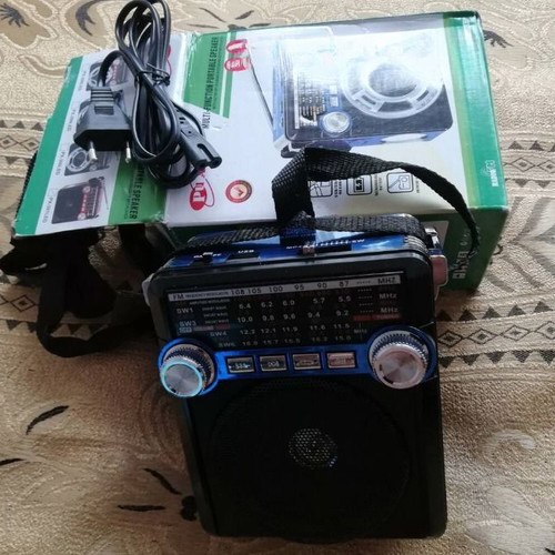 Radio receiver with powerful flashlight new, blue