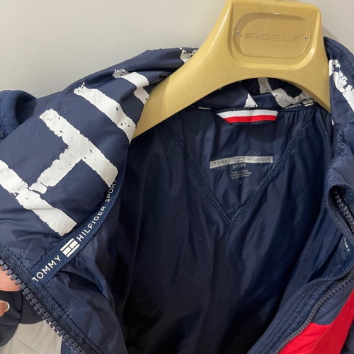 Tommy Hilfiger women’s puffer jacket used, size medium, colorblock design
