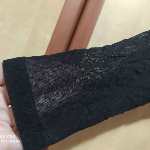 Helios black bodysuit like new with mesh sleeves and neckline