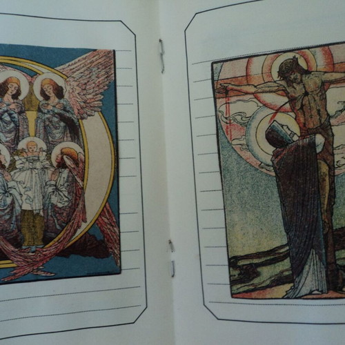 Album with over 50 used religious chromolithograph cards