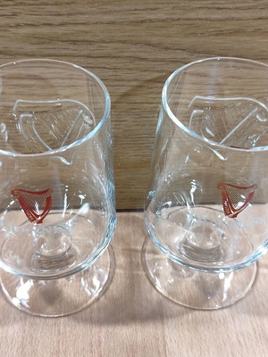 Guinness beer set of two promotional stemmed glasses 0.33lt new