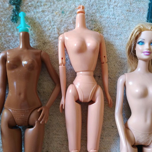 Barbie bodies and doll like new, 4 bodies, 3 mermaids, 1 Fashionista