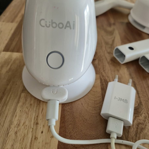 CuboAi Plus Smart Baby Monitor used with floor, crib and table stands