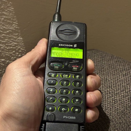 Ericsson 388 used, black, works with charger only