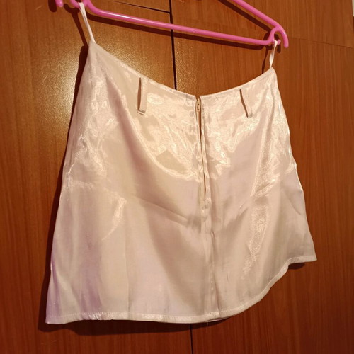 Mini skirt used, iridescent soft pink, size M