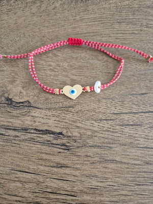 Martaki bracelet with heart eye charm new, red