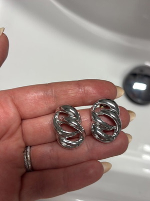 Steel earring new, silver color