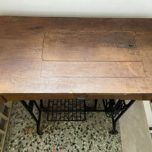 Naumann sewing machine used with cabinet and wheel