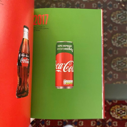 Collectible bottles and book 50 years Coca Cola new
