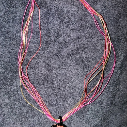 Handmade pendant new with colorful cords and silver clasp
