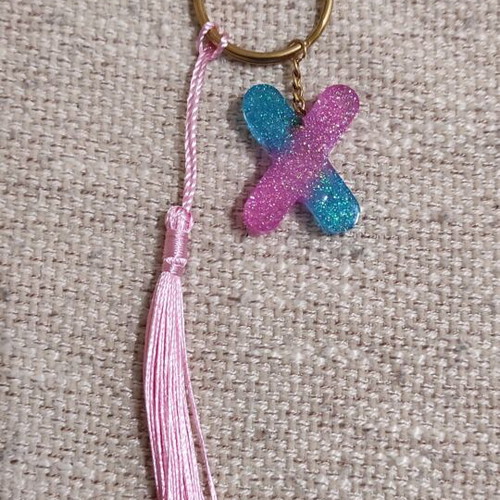Handmade keychain with resin letter X and tassel