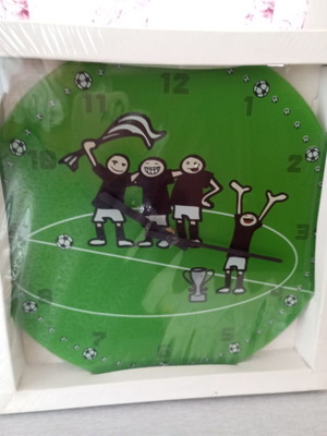 Wall clock with football theme, quartz mechanism, glass/plastic surface