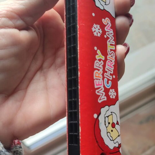 Christmas maraccas and harmonica used for kids