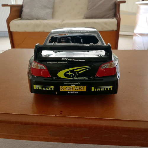 Gas-powered remote control Subaru racing car like new
