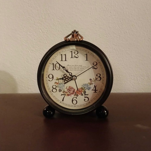 Vintage clock used, old style, battery operated