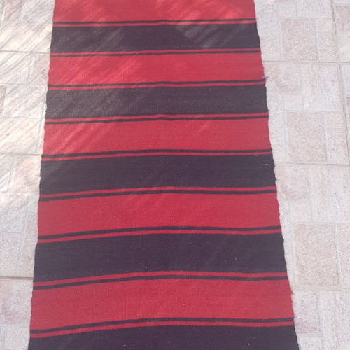 Handmade wool loom rug used