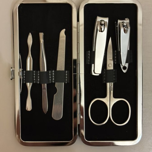 Max Factor nail care set with scissors, clippers, file, tweezers, cuticle tool