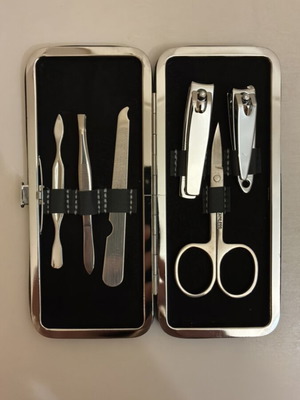 Max Factor nail care set with scissors, clippers, file, tweezers, cuticle tool