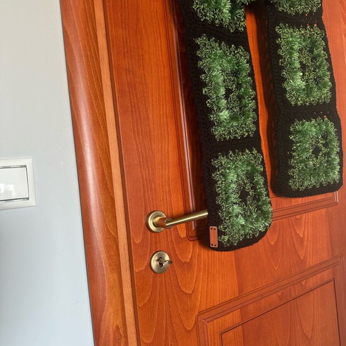 Handmade knitted scarf new with granny squares in black and green