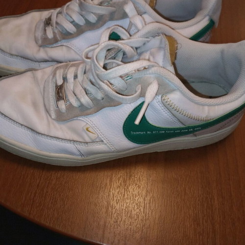 Nike low athletic shoes used, size 43, white with leather