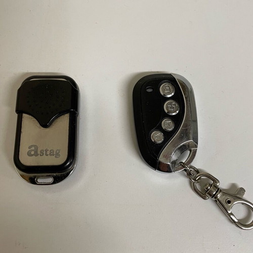 Astag garage door remote controls like new, pack of 2