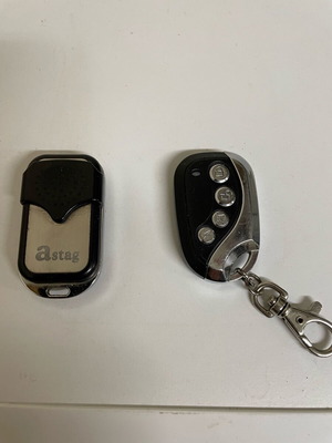 Astag garage door remote controls like new, pack of 2