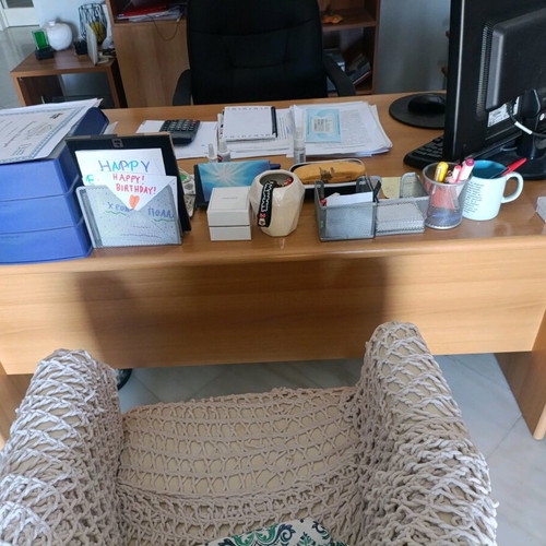 Desk with bookshelf and auxiliary table used