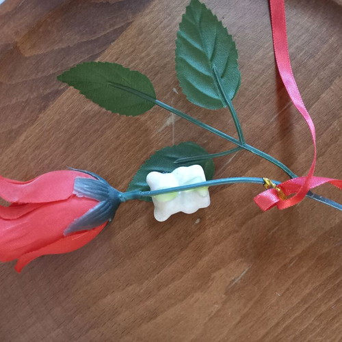 Decorative rose with small bear, plastic