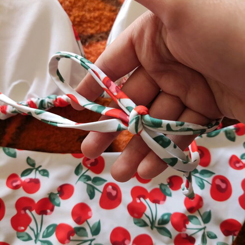 High-waisted swimsuit L with cherries like new, white and red