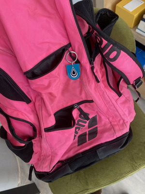 Arena pool bag with compartments used, fuchsia color