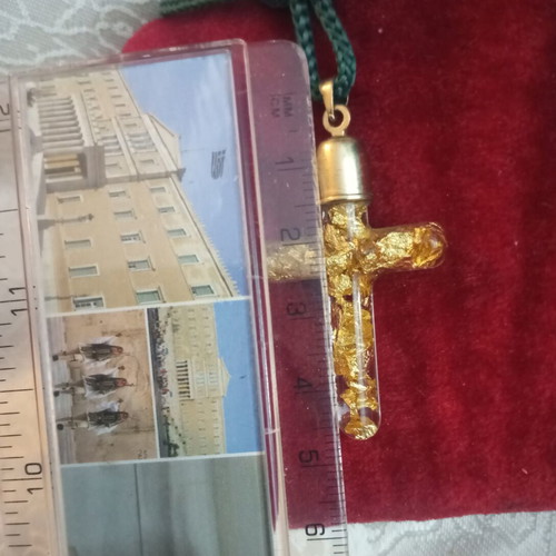Cross with pure gold leafs in solution, metal
