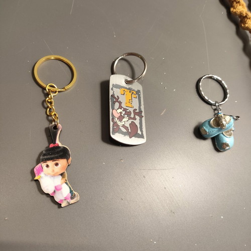 Set of 3 keychains: Agnes Despicable Me, Taz Looney Tunes, blue baby shoes