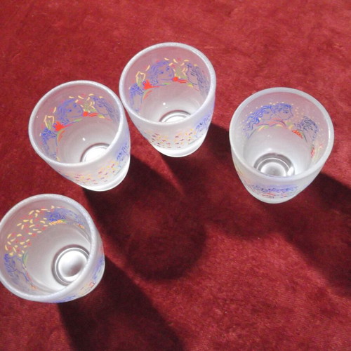 Collectible shot glasses set of 4 designed by G. Stathopoulos like new
