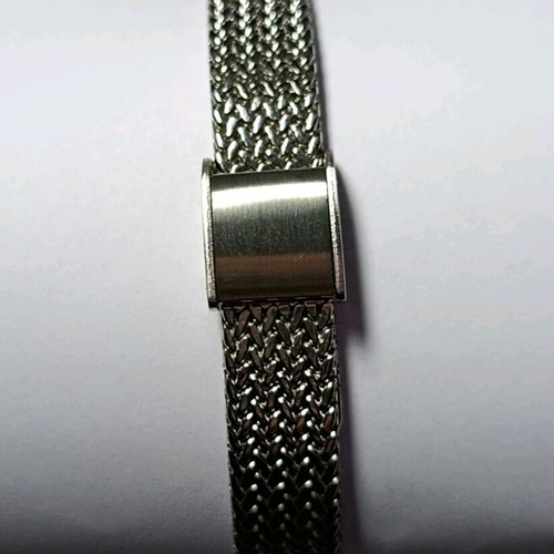 Silver women's watch like new with mesh bracelet and rhinestones