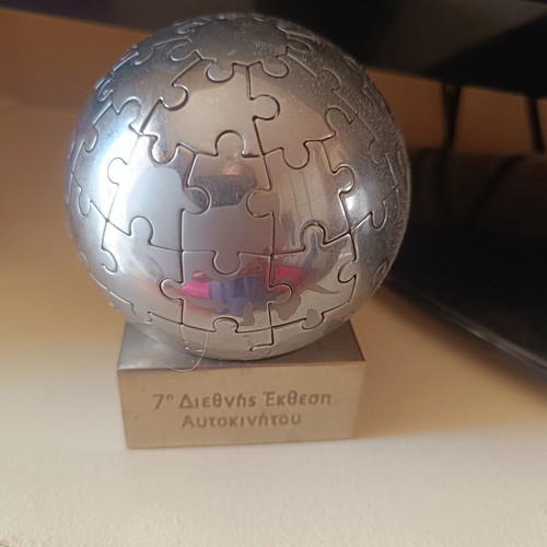 Decorative puzzle globe from international car exhibition, used