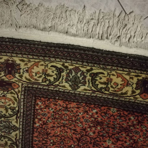 Handmade silk rug used with classic design and warm colors