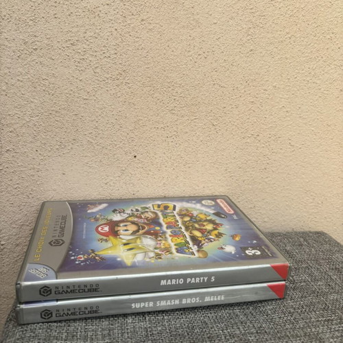 GameCube empty cases with Mario manual