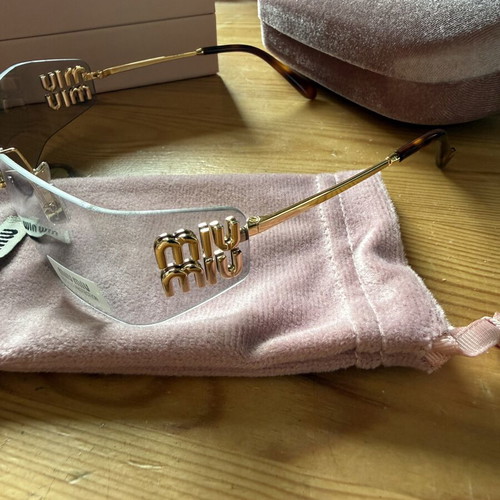 Miu Miu sunglasses, grey and gold