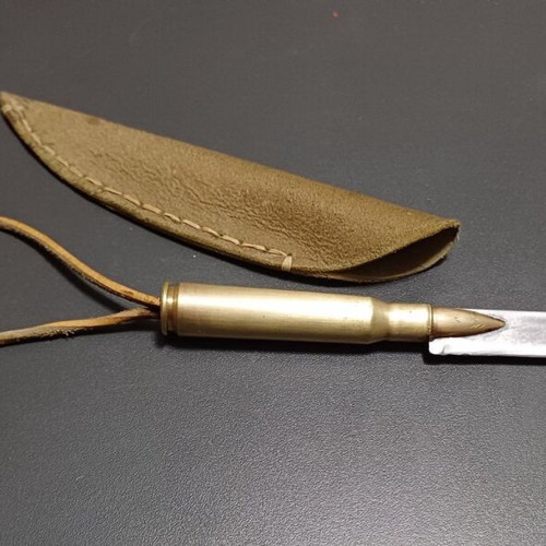 Handmade knife like new with leather sheath and spring blade
