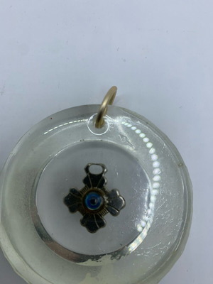 Silver cross with eye and wooden cross in liquid glass new