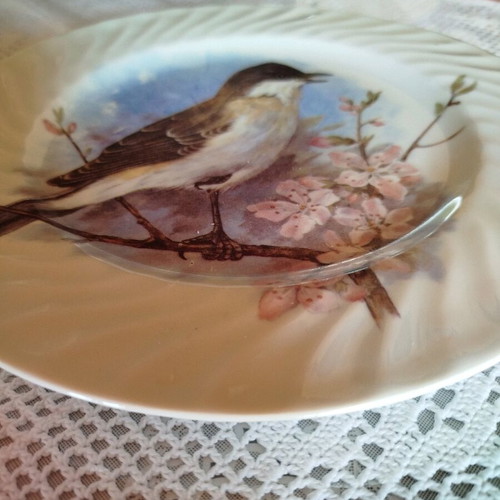 Vintage wall plate used in pink and sky blue tones