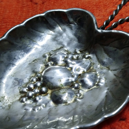 Vintage silver plated leaf-shaped plate used with embossed design
