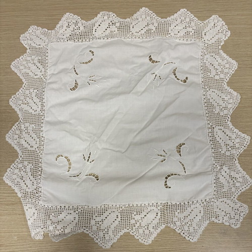 Handmade white tablecloth with cutwork embroidery and crochet lace, used