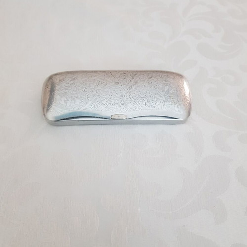 Vintage metal glasses case with embossed floral design, silver, used