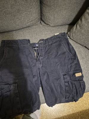 Dark blue bermuda shorts used, size 36